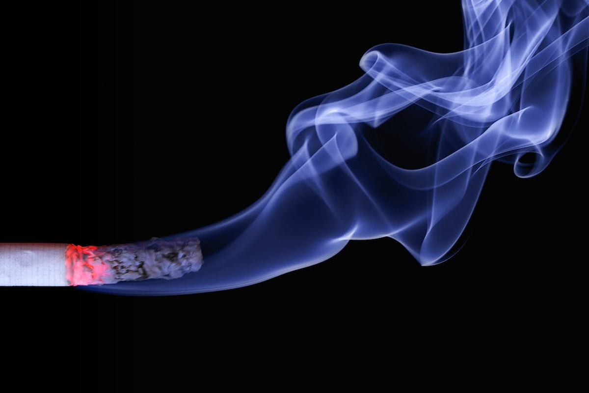 Smoking or smoking-related odor that drift into other property